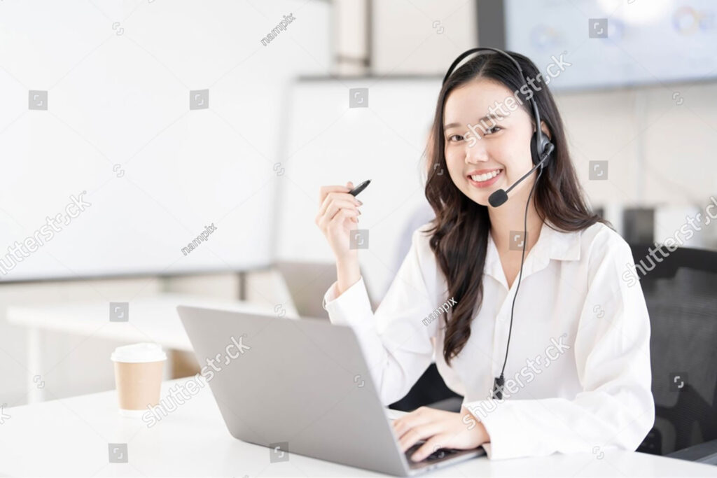 stock-photo-young-asian-customer-service-representative-using-a-headset-while-working-at-a-call-center-2577654705